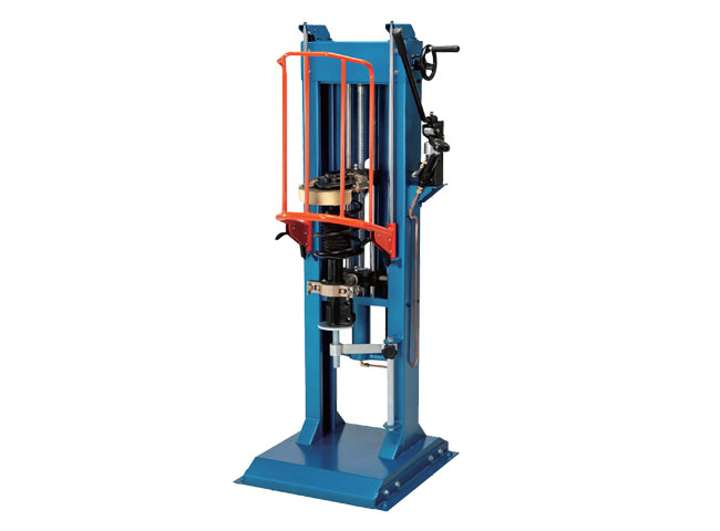 coil spring compressor with safety cage